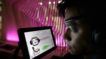 A computer screen displays Chris Aimone's brain waves (top purple line) (J.P. Moczulski for The Globe and Mail)