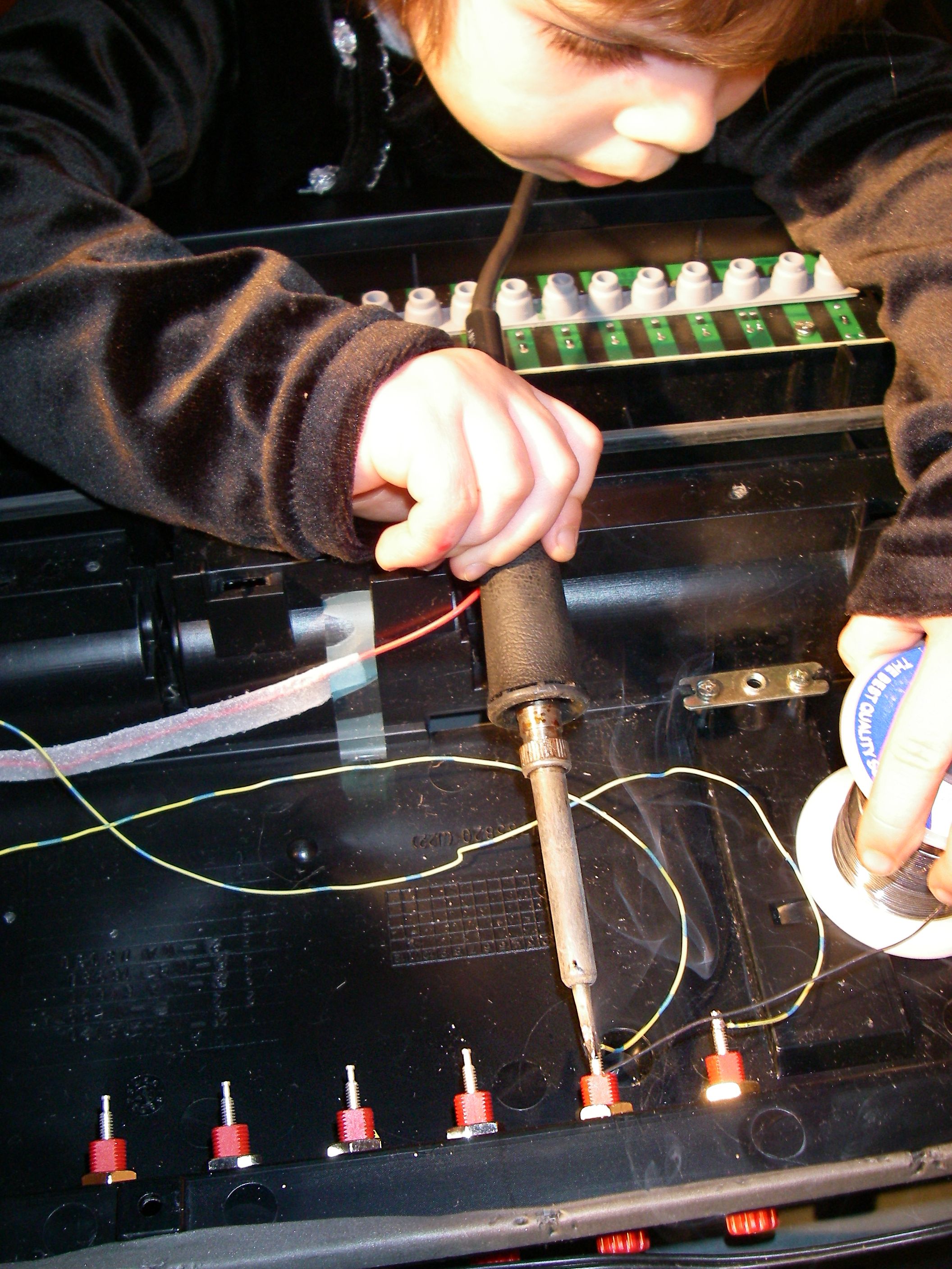 Demonstrating proper soldering technique